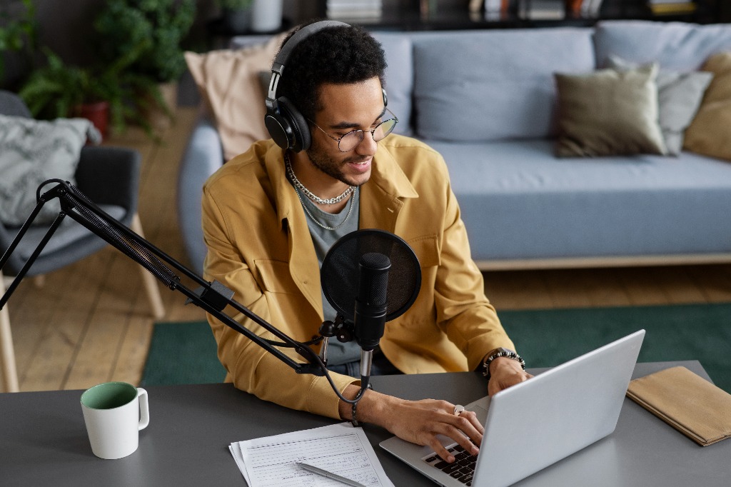 Creator working at laptop